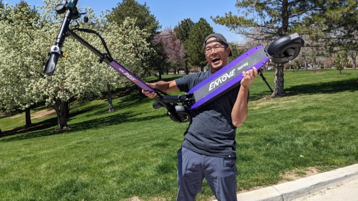 2023 EMOVE Touring Jimmy-Struggling-to-Carry-the-Purple-EMOVE-Touring
