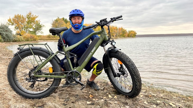 Bee-Cool-Adventurer-Fat-Tire-Ebike-with-Full-Suspension-in-Army-Green-on-the-Beach