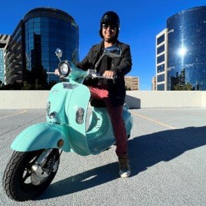 Aventura-X-Electric-Scooter-that-Looks-like-a-Vespa-with-Andrew-in-Downtown