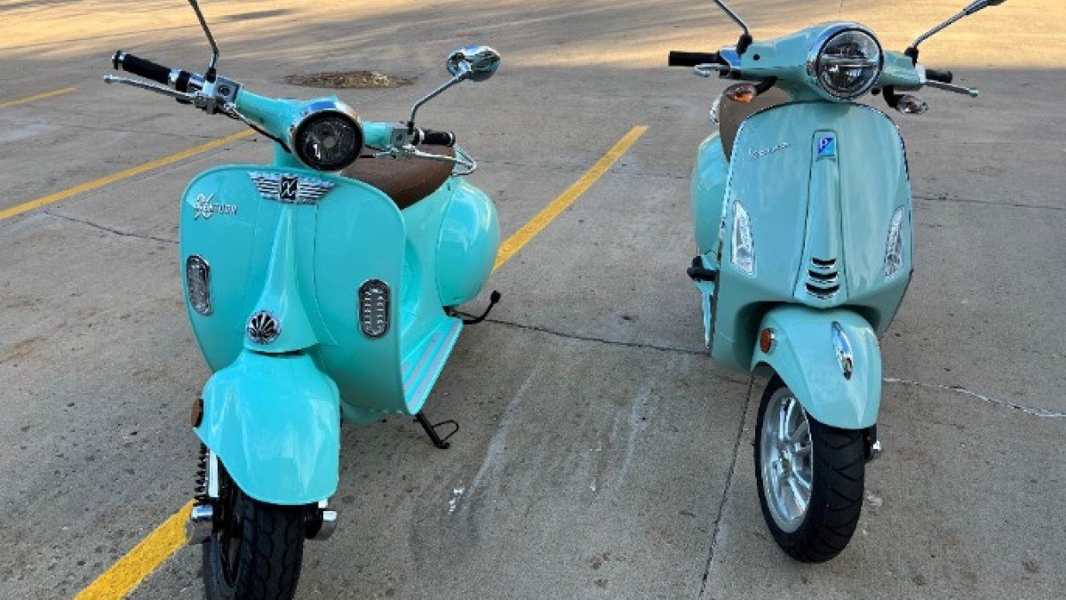 2023 Aventura X Aventura-X-Electric-Scooter-next-to-a-Vespa-50cc-Primavera