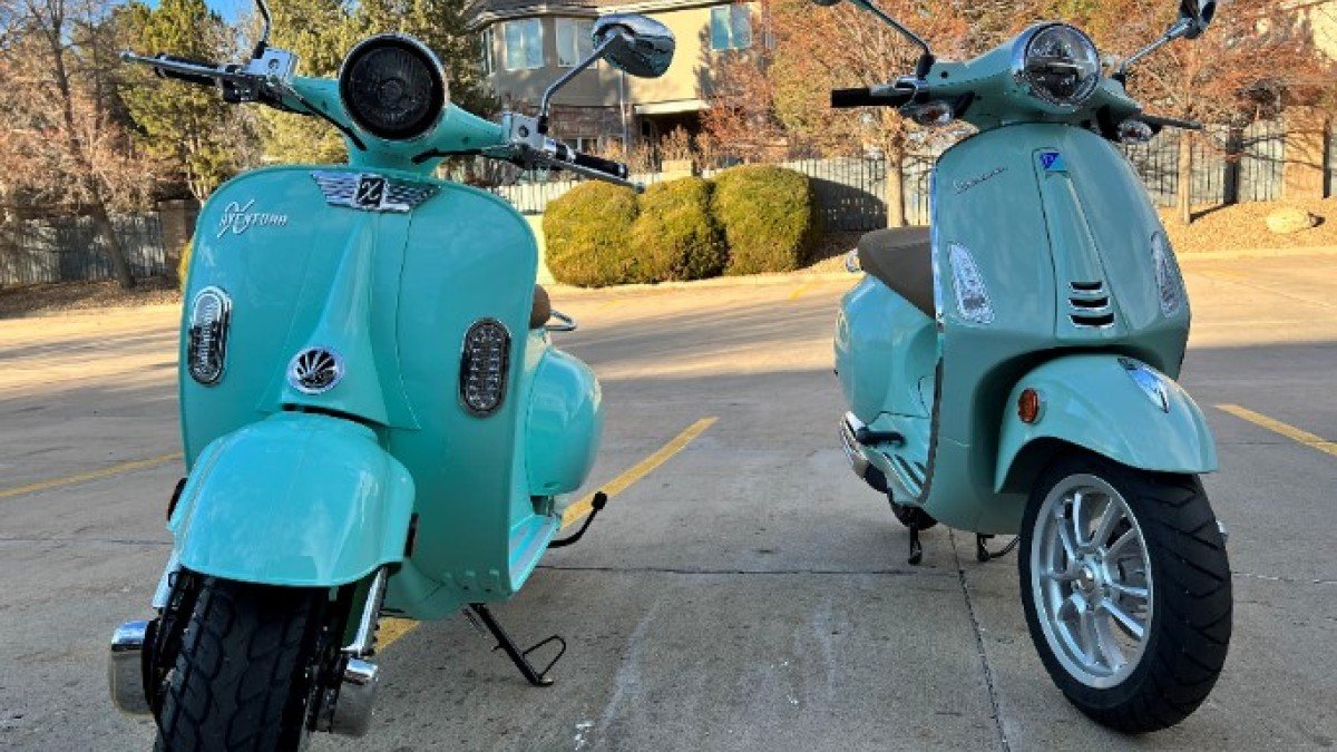2023 Aventura X Aventura-X-Electric-Scooter-next-to-a-Vespa-50cc