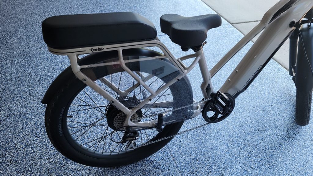 Ride1up-Cafe-Cruiser-Comfy-Seat-and-passenger-seat-with-wheel-guard-and-pegs-1024x578