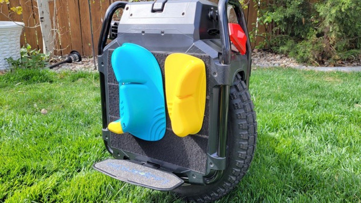 2022 Leaperkim Veteran Sherman Max Veteran-Sherman-Max-Rear-on-Grass-showing-its-roll-cage-and-knobby-kenda-tire-with-grizzla-pads