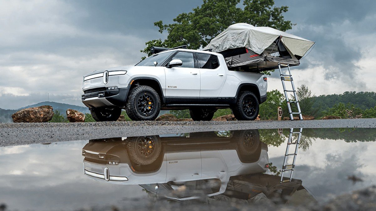 2022 Rivian R1T white truck rooftop tent